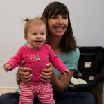 Mom and baby are happy singing together
