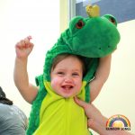 Baby in frog costume